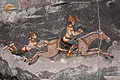 Chiang Mai - Wat Phra That Doi Suthep. The walls of the gallery are covered with Buddha statues and mural paintings of Jataka and tales of the previous lives of the Buddha.